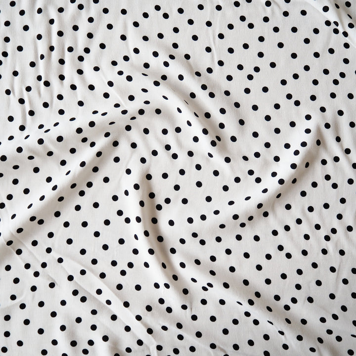 Fabric Godmother Ivory Vivian Polka Dot Viscose Crepe Fabric – ivory viscose crepe with black polka dots
