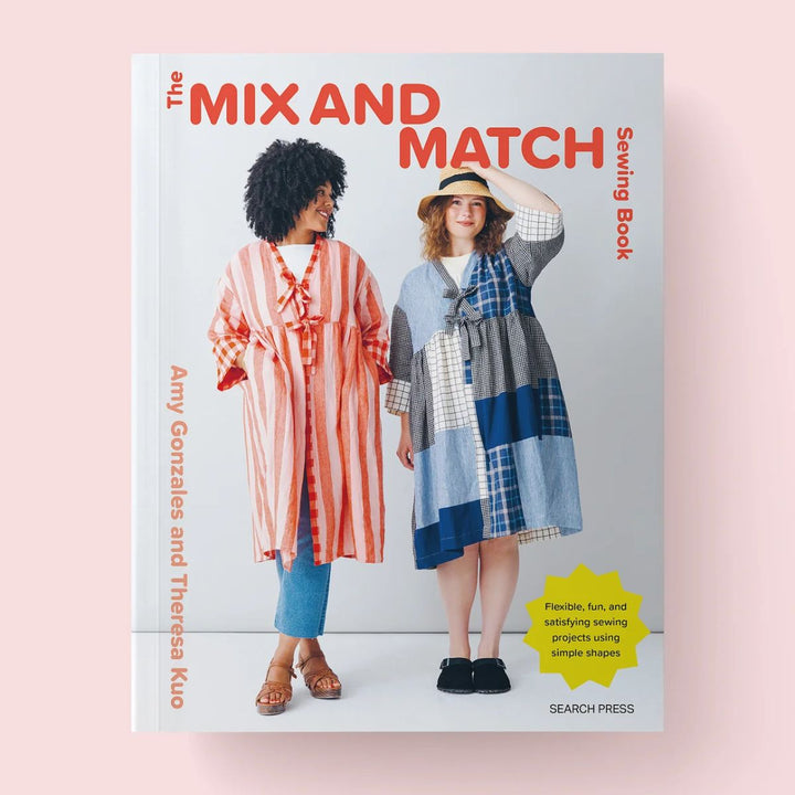 Book titled 'Mix and Match Sewing Book' featuring two women in colorful outfits on a pink background.