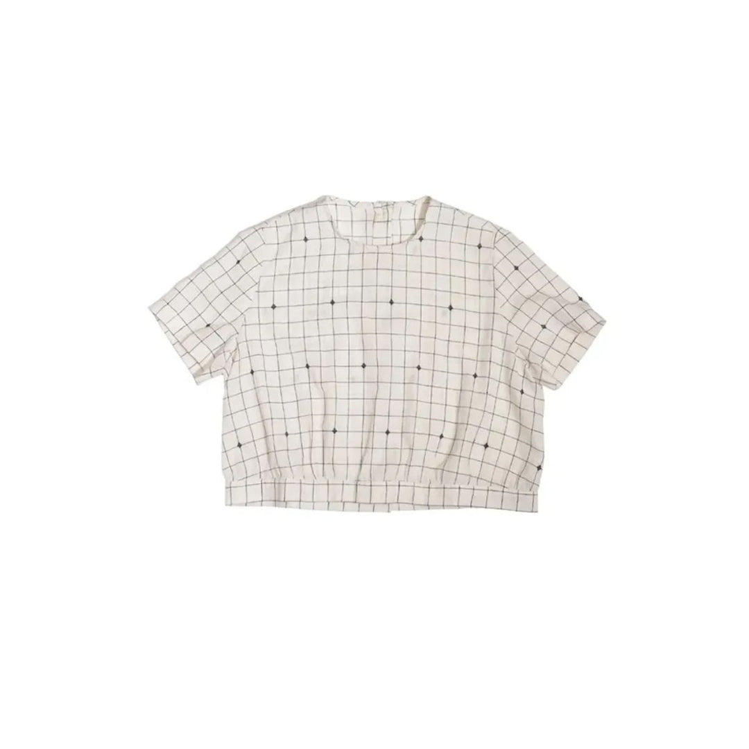 Grid-patterned shirt on a white background