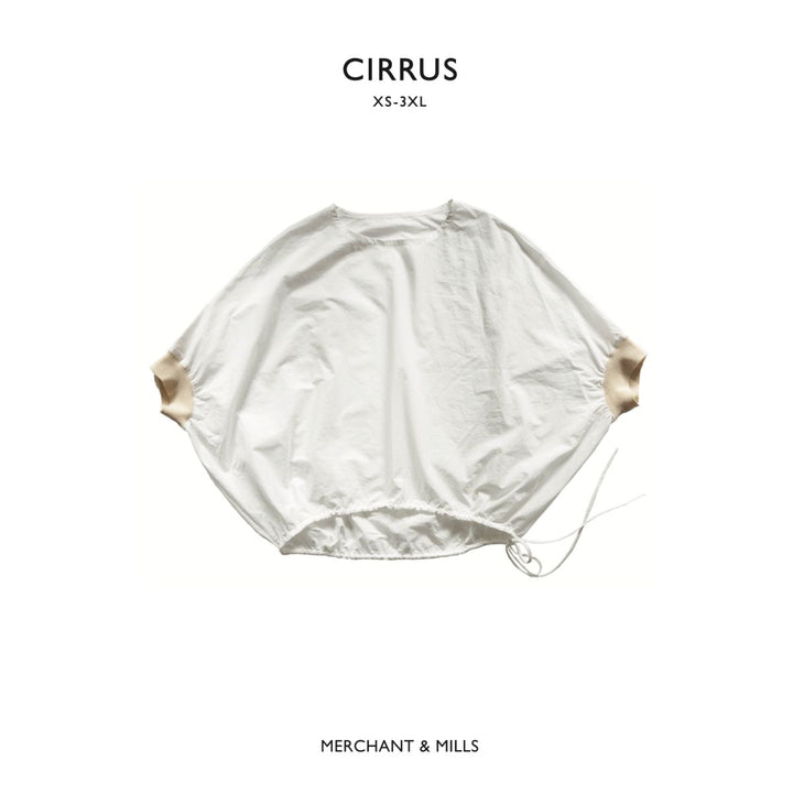 White top with gold accents on a white background, featuring the brand 'Cirrus' and 'Merchant & Mills'.