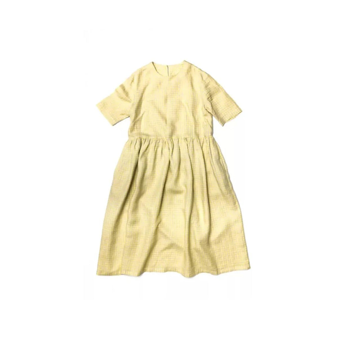 Yellow dress on a white background