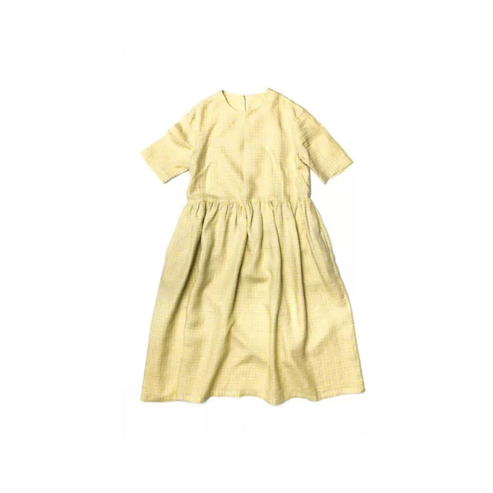 Yellow dress on a white background