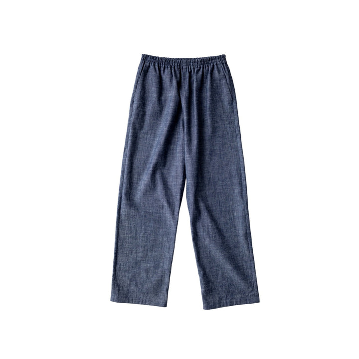 A pair of dark blue denim pants with an elastic waistband, shown flat against a solid white background.