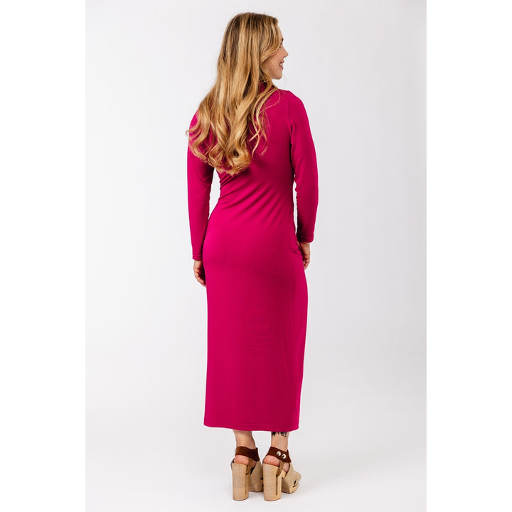 A woman wearing a long-sleeve magenta midi dress, shown from the back and side against a plain white studio background.
