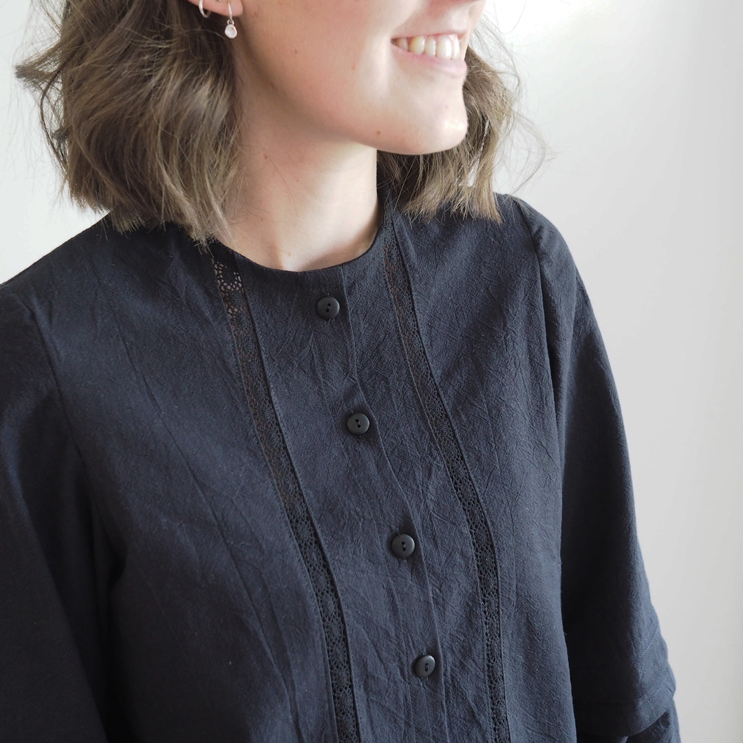 Natural textured cotton blouse with lace insert and bias-bound neckline