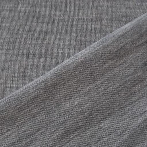 Close-up of grey merino wool jersey fabric with visible texture