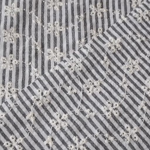 Cotton dressmaking fabric with grey and white design and floral embroidery