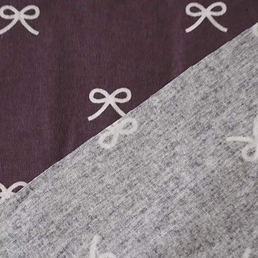 Pretty Bow Cotton Flannel Fabric with white bow print on a purple background