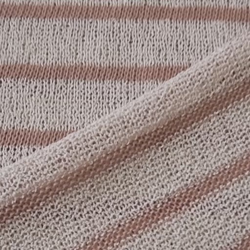Loose knitted dressmaking fabric with rose pink and ecru stripes