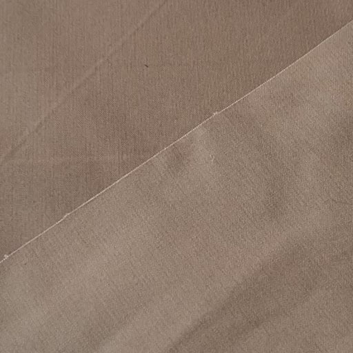 Sand waxed cotton fabric with water-resistant finish for outerwear sewing.
