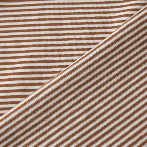 Striped cotton jersey fabric with brown-orange and white stripes