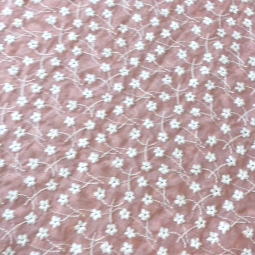 Rose pink embroidered cotton voile dressmaking fabric