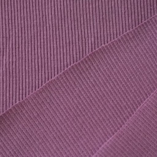 Close-up of orchid pink ribbing fabric with a ribbed texture