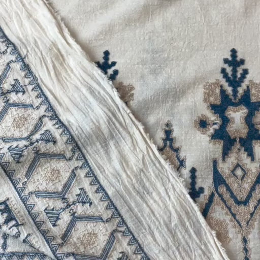 Geo border embroidered cotton blend dressmaking fabric