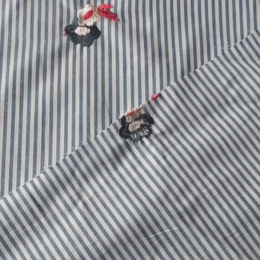 Embroidered florals on blue and white stripe cotton fabric