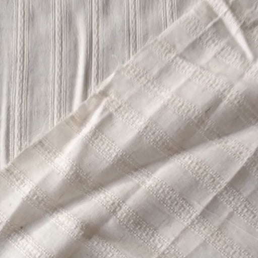 Cream striped cotton jacquard dressmaking fabric