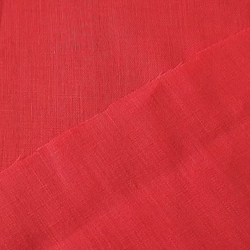 Linen dressmaking fabric in a bright coral orange-pink colour