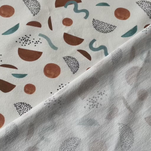 Wiggle shapes cotton French terry sweatshirt fabric for dressmaking