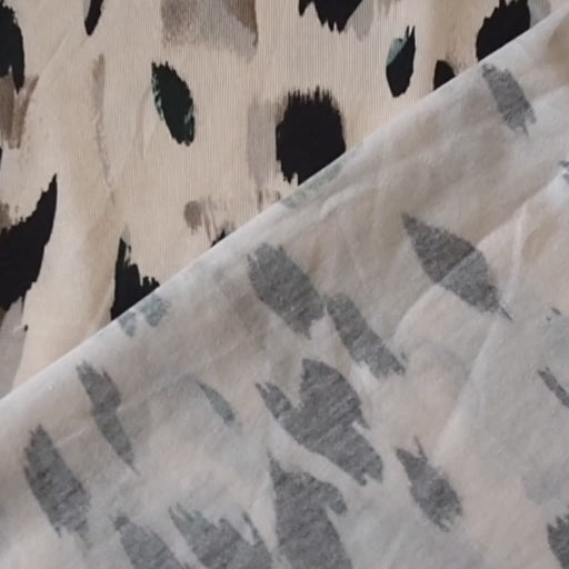 Stretchy viscose jersey dressmaking fabric with abstract pattern