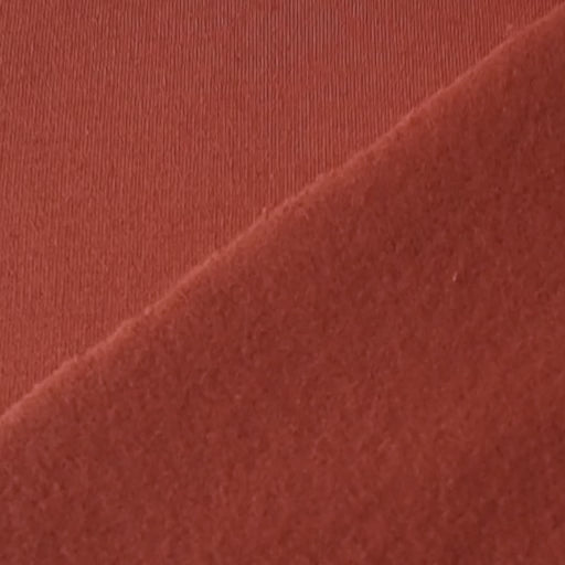 Terracotta fleeceback organic cotton sweatshirting fabric, cosy and stretchy for sweatshirts and joggers.