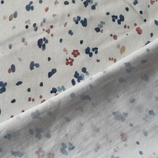 Pastel confetti organic cotton jersey stretch fabric for dressmaking