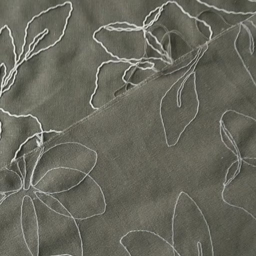 Khaki viscose linen dressmaking fabric with embroidered floral pattern