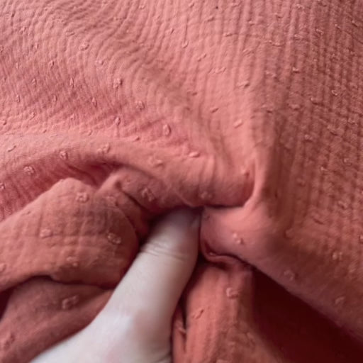 Rust dobby spot cotton double gauze dressmaking fabric