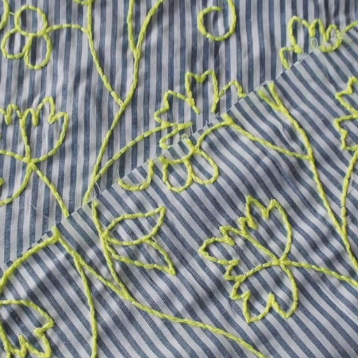 Neon embroidered floral striped cotton dressmaking fabric