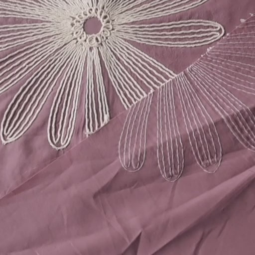 Dusky pink large scale embroidered daisy cotton dressmaking fabric