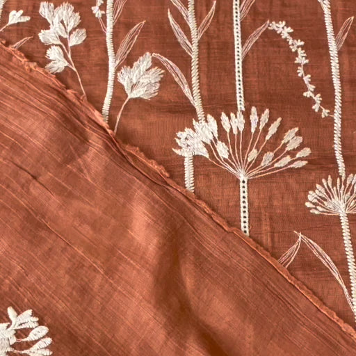 Rust embroidered stems lyocell blend fabric for dressmaking