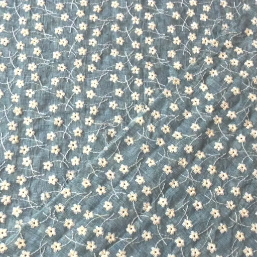 Sky blue embroidered cotton voile dressmaking fabric